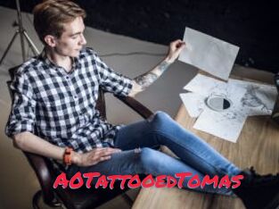 A0TattooedTomas